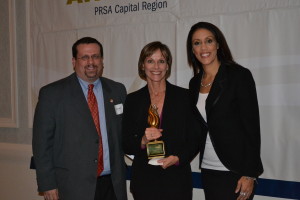 Photo of Carolyn Jones, Albany Business Review, receiving Outstanding Communicator Award at the 6th Annual PRSA Capital Region Empire Awards. 