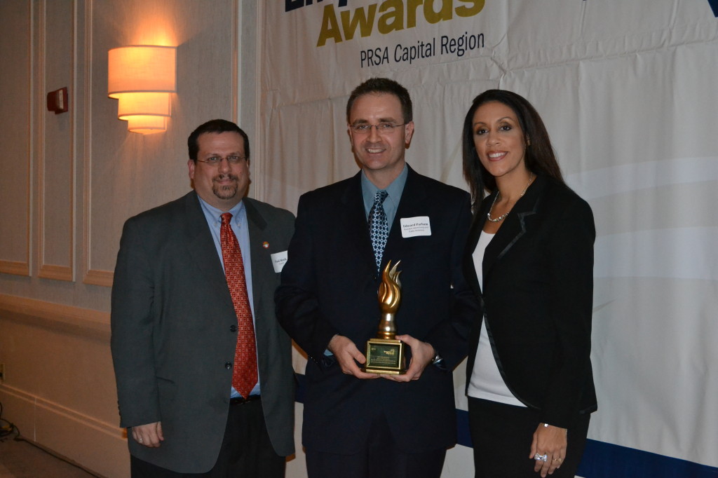 Photo of Edward Parham, Rueckert Advertising and Public Relations, receiving Outstanding Practitioner Award at the 6th Annual PRSA Capital Region Empire Awards.